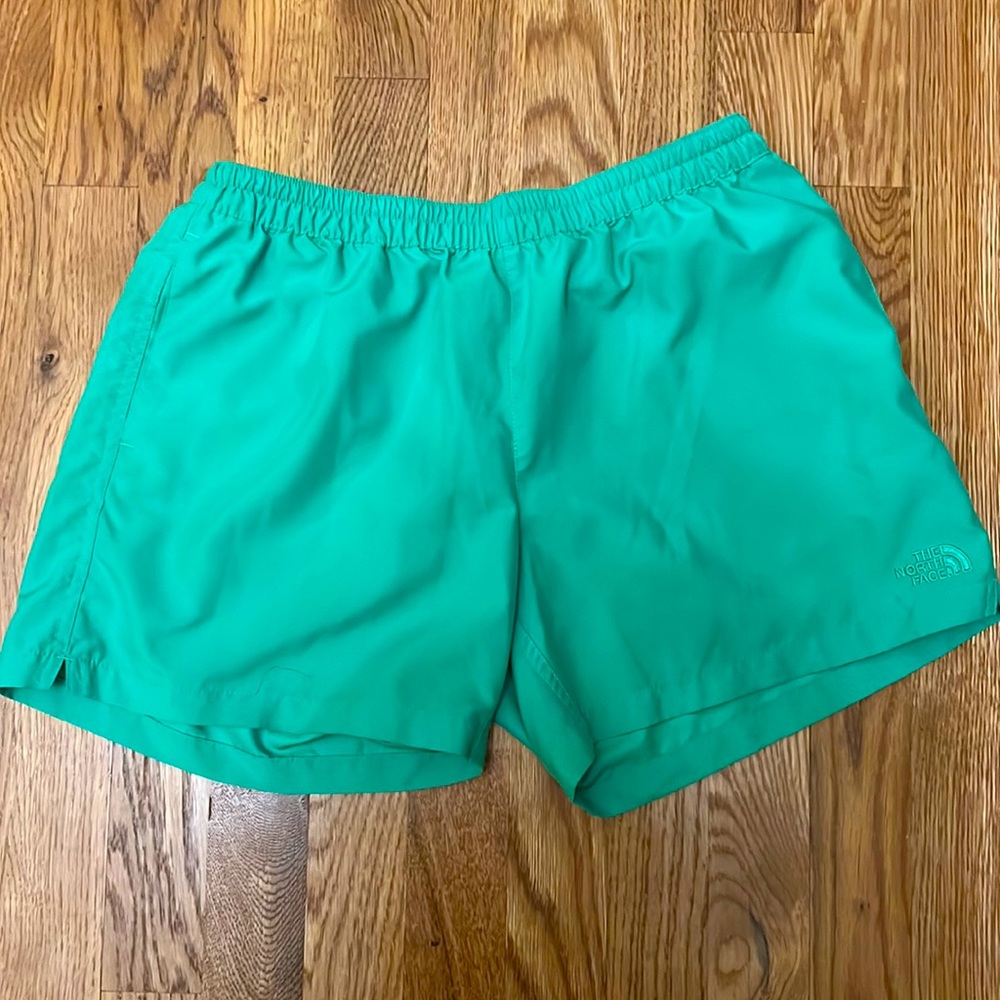 The North Face green running shorts